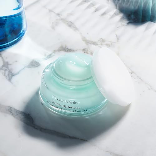 Elizabeth Arden Visible Difference face cream in a pale aqua glass jar with white lid and refined black lettering