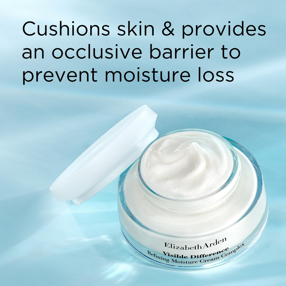 Elizabeth Arden Visible Difference face cream in a clear glass jar, with rich white moisturizer and a matching lid