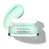 Elizabeth Arden Visible Difference face cream in a mint-green glass jar with a white lid and matching gel swatch