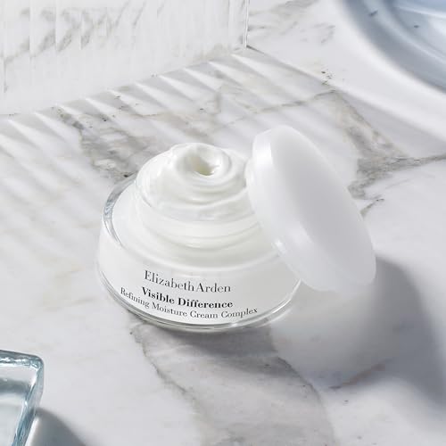 Elizabeth Arden Visible Difference face cream in a clear round jar, white rich moisturizer with a smooth cream texture