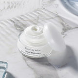 Elizabeth Arden Visible Difference face cream in a clear round jar, white rich moisturizer with a smooth cream texture