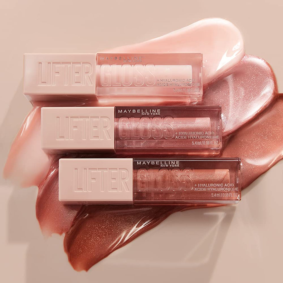 Maybelline Lifter Gloss tubes in pale pink, rosy nude and brown shades, with clear rectangular cases and embossed caps