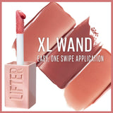 Maybelline Lifter Gloss with a pink XL wand applicator beside glossy nude-pink swatches and one-swipe application text