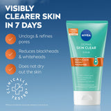 NIVEA Derma Skin Clear Scrub in a turquoise squeeze tube with white flip cap and orange ingredient panel.
