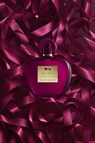 Antonio Banderas Her Secret Temptation perfume bottle on satin ribbons