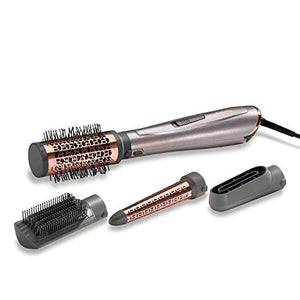 BaByliss 4 in 1 Hair Dryer Styler in rose gold and silver with interchangeable round brush, paddle brush and styling attachments
