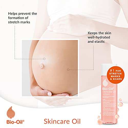 Bio-Oil Skincare Oil bottle in a pink and white design beside a pregnant belly, with stretch mark care messaging