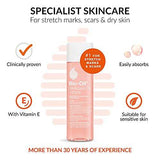 Bio-Oil Skincare Oil in a clear bottle with pale pink oil and label, shown with claims for stretch marks and scars
