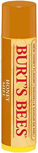 Burt's Bees Honey Lip Balm in a golden yellow tube with a brown cap, red lettering and honey label