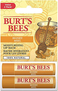 Burt's Bees Honey Lip Balm two-pack with two golden tubes in yellow honeycomb blister packaging and a bee illustration
