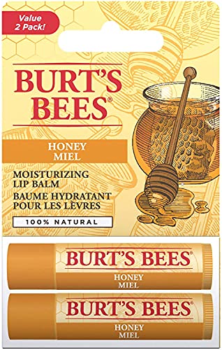 Burt's Bees Honey Lip Balm two-pack with two golden tubes in yellow honeycomb blister packaging and a bee illustration