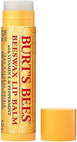 Burt's Bees Honey Lip Balm in a yellow tube with a honeycomb pattern and matching cap, shown uncapped