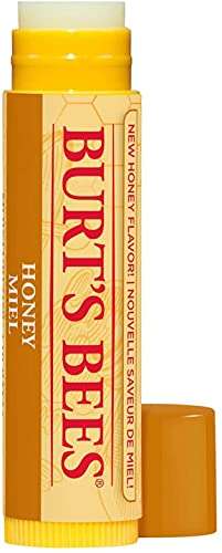 Burt's Bees Honey Lip Balm in a yellow tube with a cream honeycomb-patterned label and orange cap
