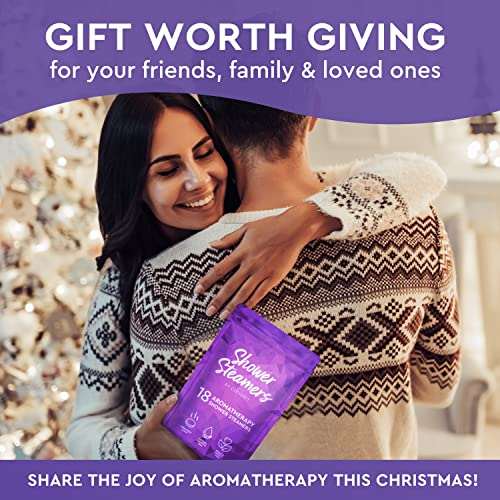 Cleverfy shower steamers aromatherapy gift pack held by smiling woman hugging partner