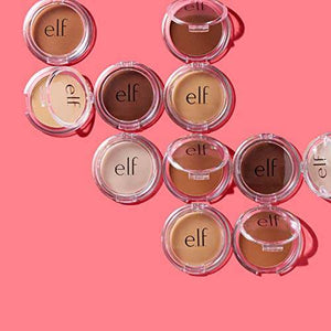 e.l.f. Prime & Stay Finishing Powder in a light beige shade, shown as a fine loose powder smear with textured edges