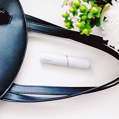 Finishing Touch Flawless facial hair remover in a slim white design with a rose gold accent band