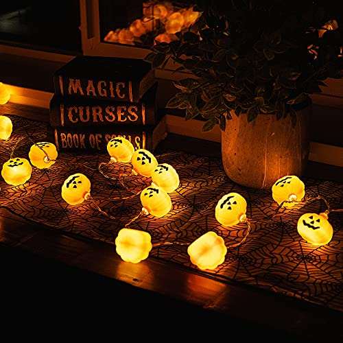 40 LED pumpkin string lights glowing on table for Halloween decor