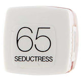 Maybelline Superstay Matte Ink lipstick shade label in a white case, marked 65 Seductress in black lettering