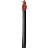 Maybelline Superstay Matte Ink liquid lipstick applicator with a black handle and nude rose-brown product-coated tip