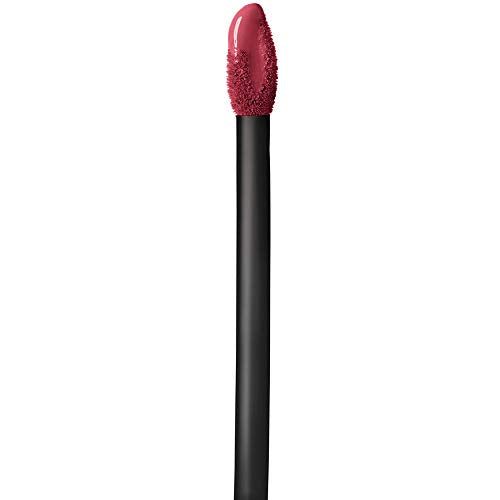 Maybelline Superstay Matte Ink liquid lipstick applicator with a black handle and deep berry-colored doe-foot tip