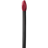 Maybelline Superstay Matte Ink liquid lipstick applicator with a black handle and deep berry-colored doe-foot tip