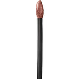 Maybelline Superstay Matte Ink liquid lipstick applicator with a black handle and nude rose-brown product-coated tip.