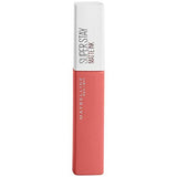 Maybelline Superstay Matte Ink liquid lipstick in a coral-pink nude shade, with a tall white cap and rectangular tube