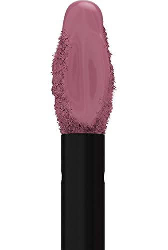 Maybelline Superstay Matte Ink lipstick shown as a dusty mauve liquid swatch with a smooth center and textured edges