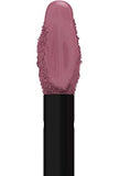 Maybelline Superstay Matte Ink lipstick shown as a dusty mauve liquid swatch with a smooth center and textured edges