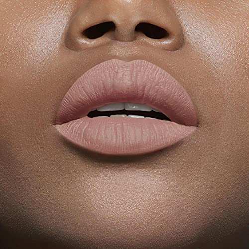Maybelline Superstay Matte Ink nude lipstick in a soft dusty rose-beige shade, shown as a smooth matte lip color.