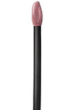 Maybelline Superstay Matte Ink liquid lipstick applicator with a black handle and dusty rose nude product on the doe-foot tip