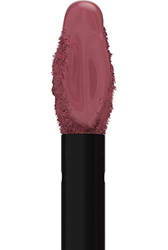 Maybelline Superstay Matte Ink liquid lipstick swatch in a muted dusty rose nude, with a smooth creamy finish.