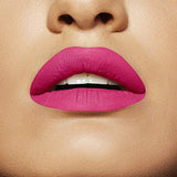 Maybelline Superstay Matte Ink lipstick shown as vibrant fuchsia-pink matte color on lips with a smooth, defined finish