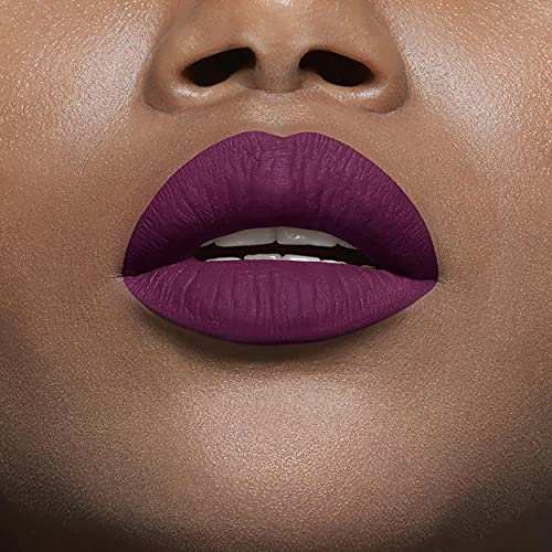 Maybelline Superstay Matte Ink liquid lipstick shown on lips in a rich matte plum shade with a smooth, opaque finish