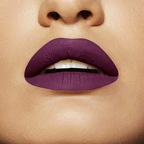 Maybelline Superstay Matte Ink liquid lipstick shown on lips in a rich matte plum-purple shade with smooth, opaque color