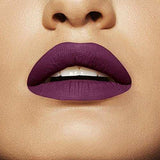 Maybelline Superstay Matte Ink liquid lipstick shown on lips in a rich matte plum-purple shade with smooth, opaque color