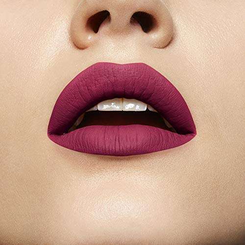 Maybelline Superstay Matte Ink liquid lipstick shown as deep mauve berry matte colour on lips with a smooth finish