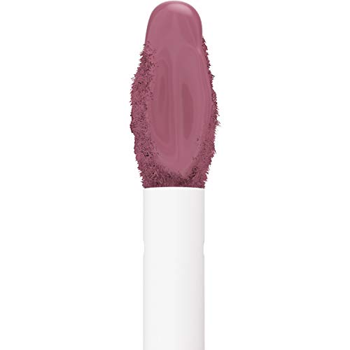 Maybelline Superstay Matte Ink liquid lipstick applicator with mauve nude color coating its rounded tip and white handle