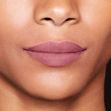 Maybelline Superstay Matte Ink liquid lipstick shown as a smooth mauve-pink matte finish on lips