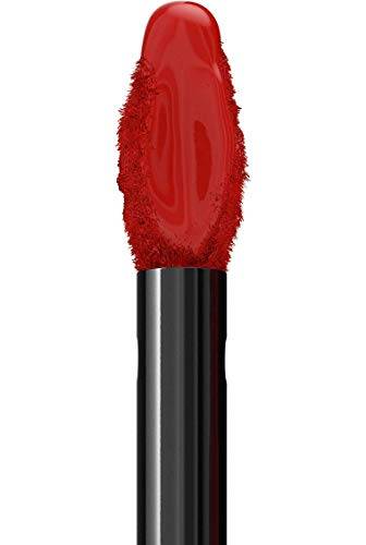 Maybelline Superstay Matte Ink liquid lipstick applicator coated in glossy orange-red pigment with a black handle