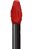 Maybelline Superstay Matte Ink liquid lipstick applicator coated in glossy orange-red pigment with a black handle