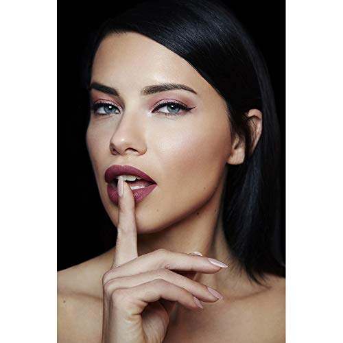 Maybelline Superstay Matte Ink lipstick in muted rose nude, shown as a creamy matte lip colour on a model