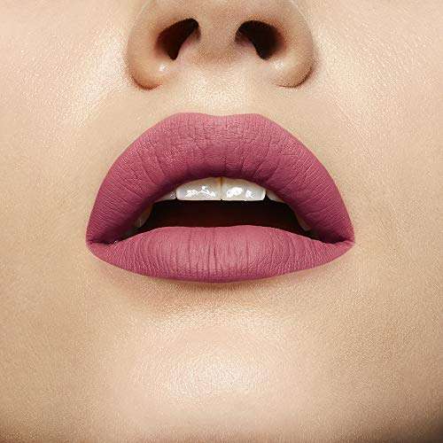 Maybelline Superstay Matte Ink liquid lipstick in muted rosy nude, shown as a smooth matte finish on the lips.