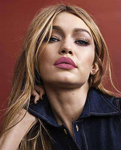 Maybelline Superstay Matte Ink lipstick in a rosy pink shade, shown worn with a smooth matte finish on the lips