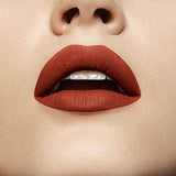 Maybelline Superstay Matte Ink liquid lipstick in a warm terracotta nude shade with a smooth matte finish on lips