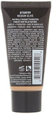 NYX Born to Glow Foundation tube in medium olive, dark charcoal packaging with a beige shade visible at the base