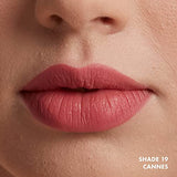 NYX Soft Matte Lip Cream in Cannes, shown as a soft dusty rose matte color on lips with a smooth finish