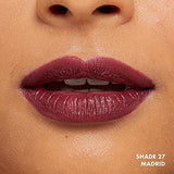 NYX Soft Matte Lip Cream lipstick in deep mauve, with a creamy matte finish shown on lips; shade 27 Madrid