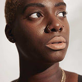 NYX Soft Matte Lip Cream in a muted nude shade shown on lips, with a smooth creamy matte finish