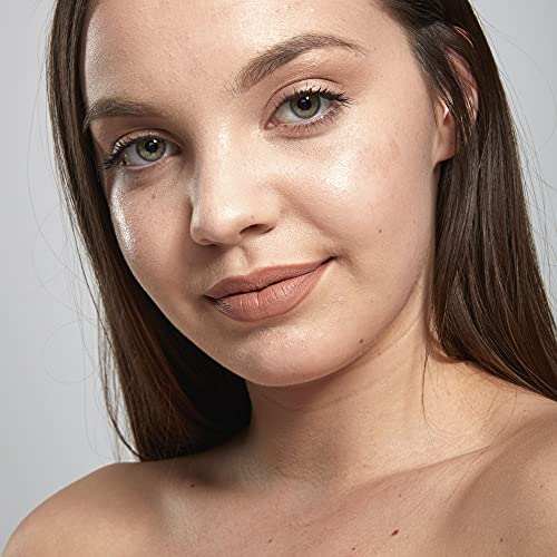 NYX Soft Matte Lip Cream shown as a muted nude-pink matte lip color on a model’s lips